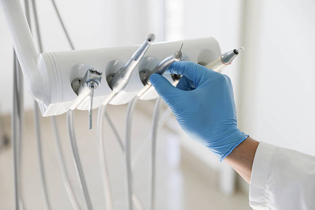 Professional Tooth Extraction technician working in Newell, WV